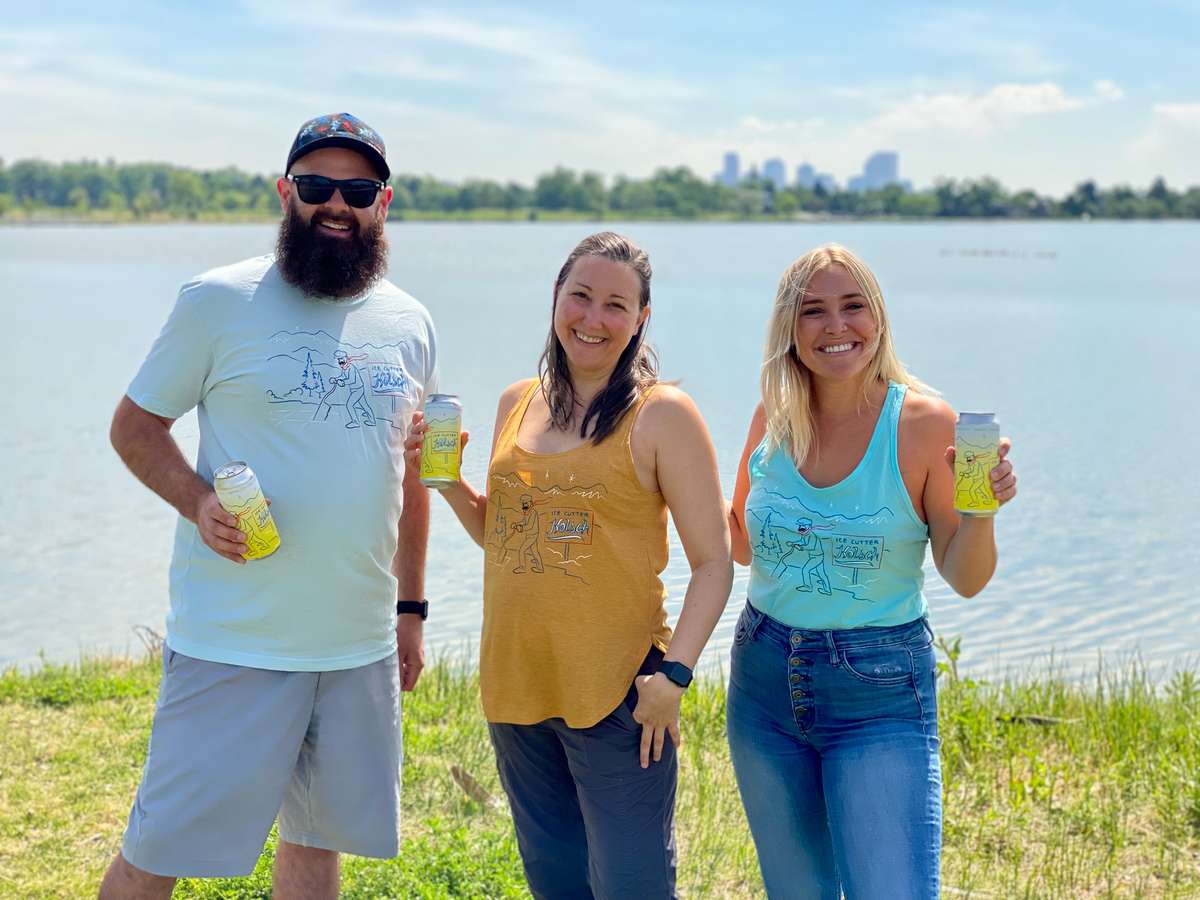 Three people wearing different versions of Kölsch shirt