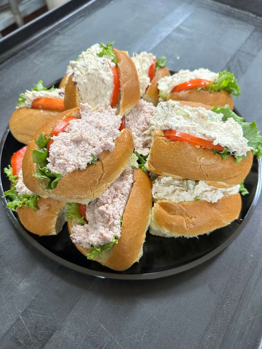 YOUR CHOICE OF TUNA, CHICKEN, EGG, HAM, SEAFOOD SALADS
ON FINGER ROLLS 
 
SERVED WITH LETTUCE & TOMATO 

SMALL $55 SERVES 10-12
MEDIUM $75 SERVES 15-20
LARGE $95 SERVES 20-24