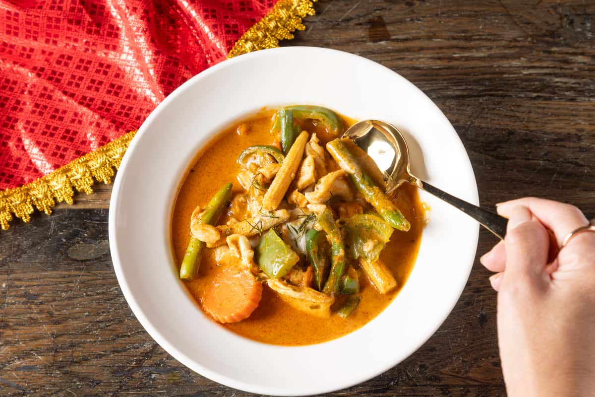 Creamy Thai curry cooked with fresh vegetables, aromatic herbs, and tender shrimp in a rich coconut broth, delivering the perfect balance of savory, spicy, and authentic Thai flavor.