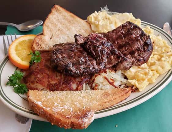 steak and eggs with hasbrowns and toast