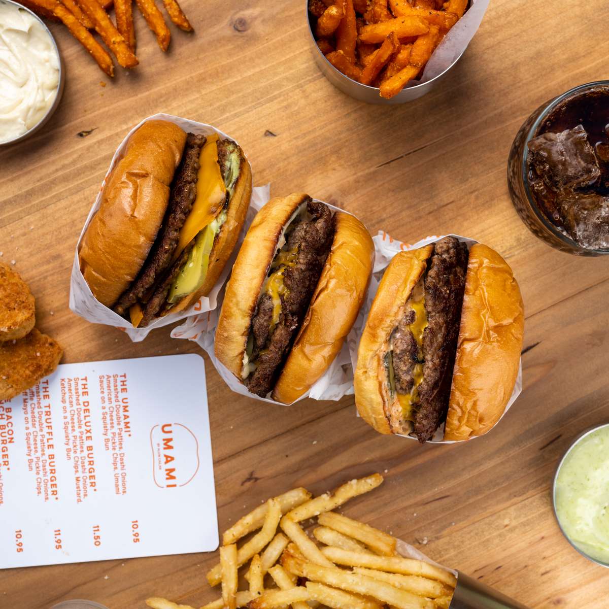 Umami Burger - 3 Burger Feature Hero Image