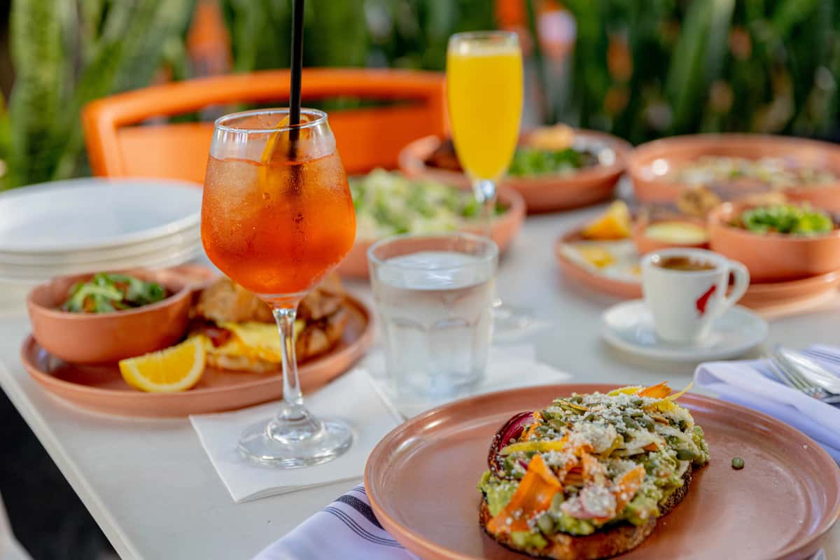 Beautifully prepared dishes and drinks arranged for a special anniversary dinner experience.