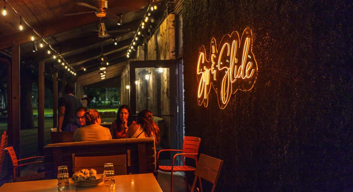 Outdoor patio dining area with glowing