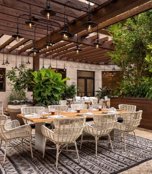 Charming restaurant exterior in Coconut Grove displaying the area's distinctive bohemian architectural style and tropical ambiance