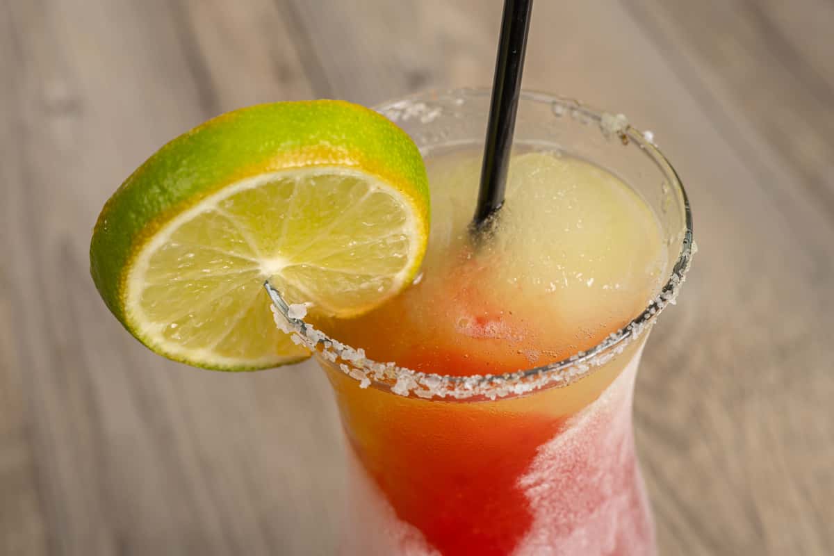 Red Cocktail with lime