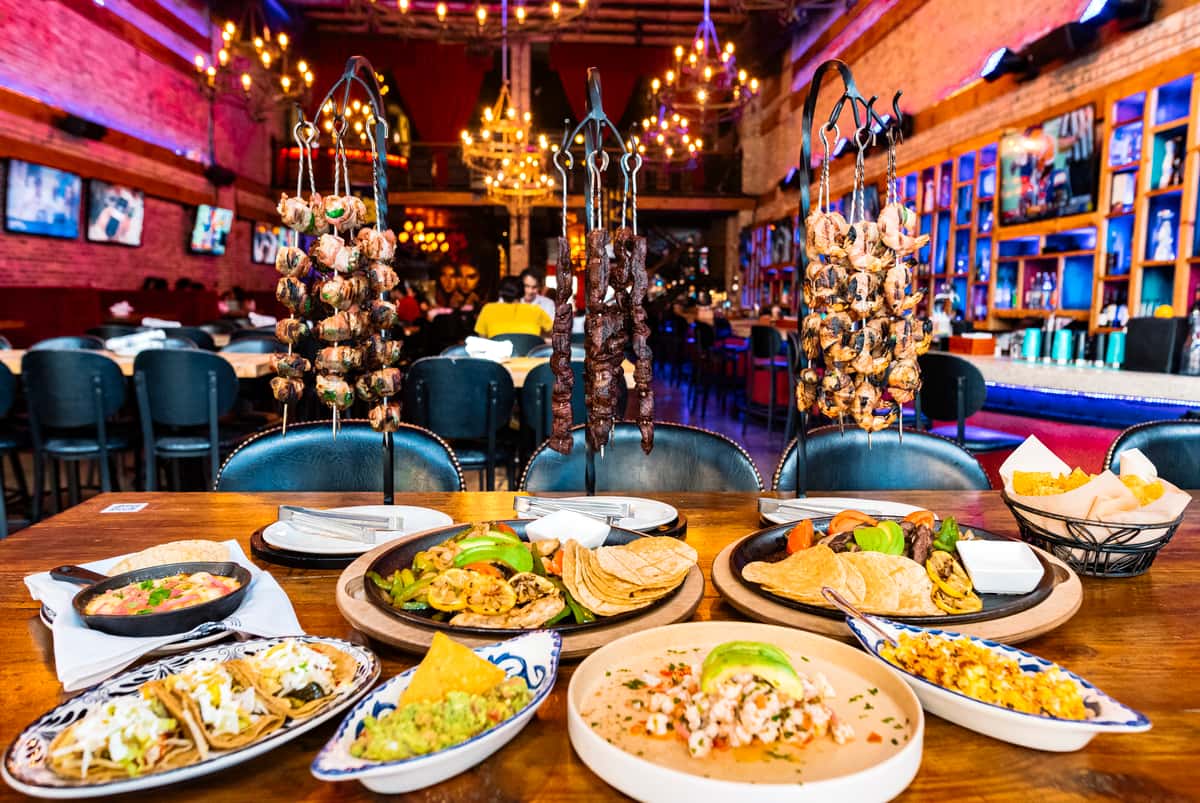 Table view of multiple entrees at Moe's Cantina River North