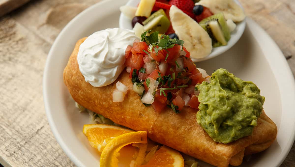 chimichanga with three dollops of sauce