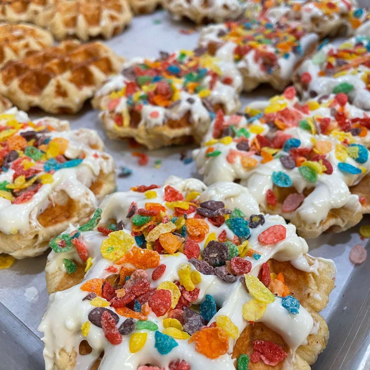 Waffles with fruit loops and white icing