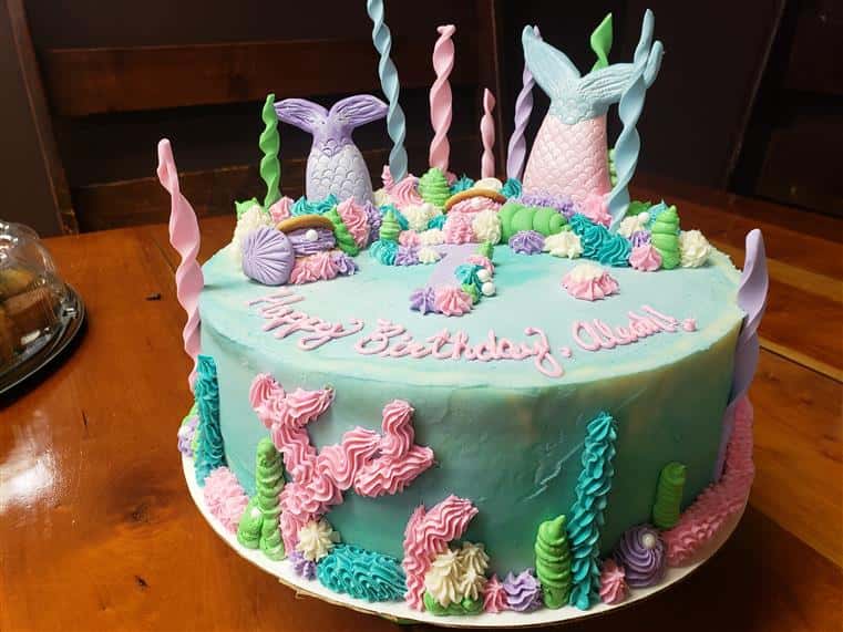 mermaid themed birthday cake with candles