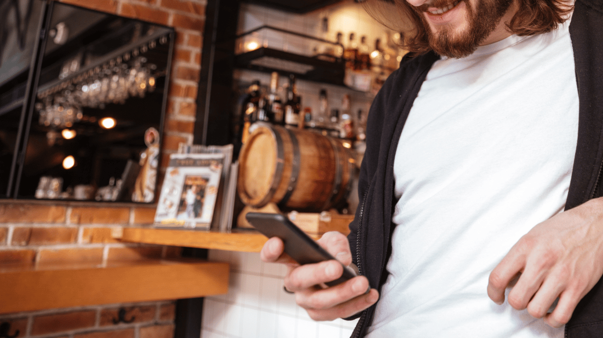 Guest checking their phone
