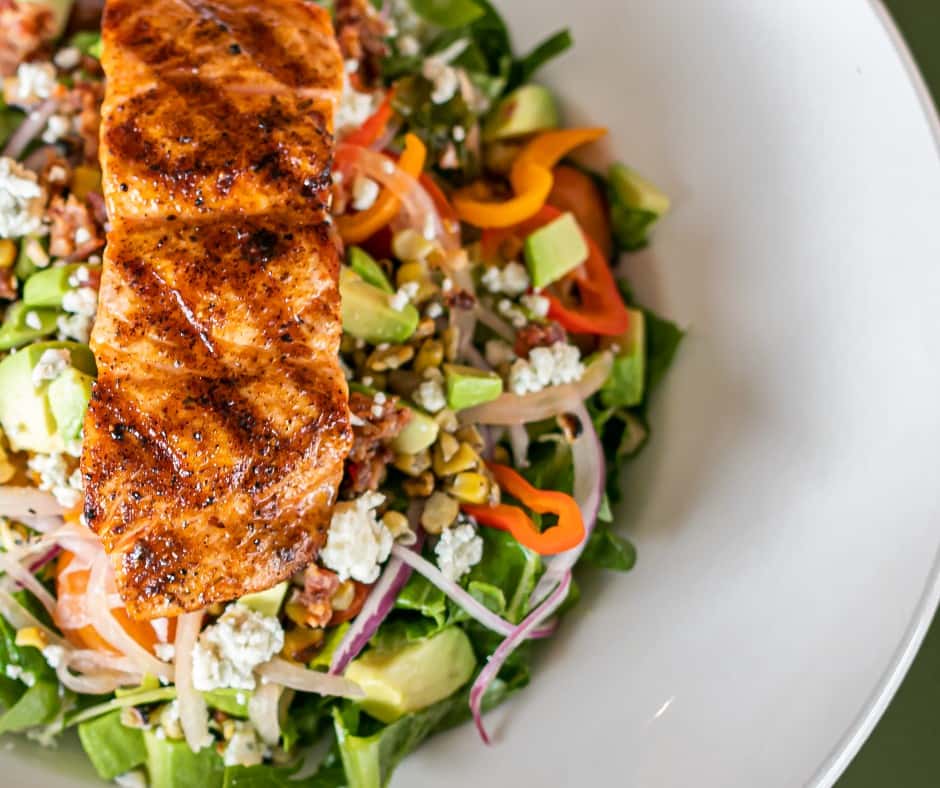salmon on chopped salad