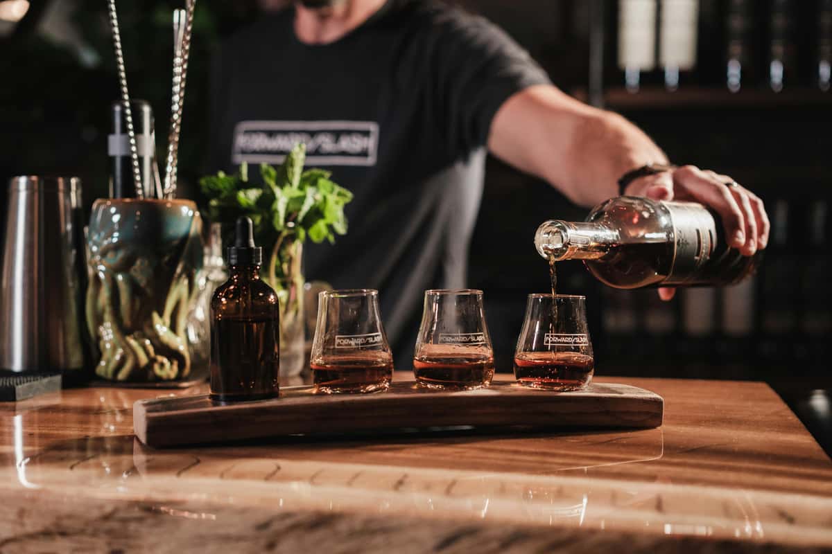 bartender pouring drinks
