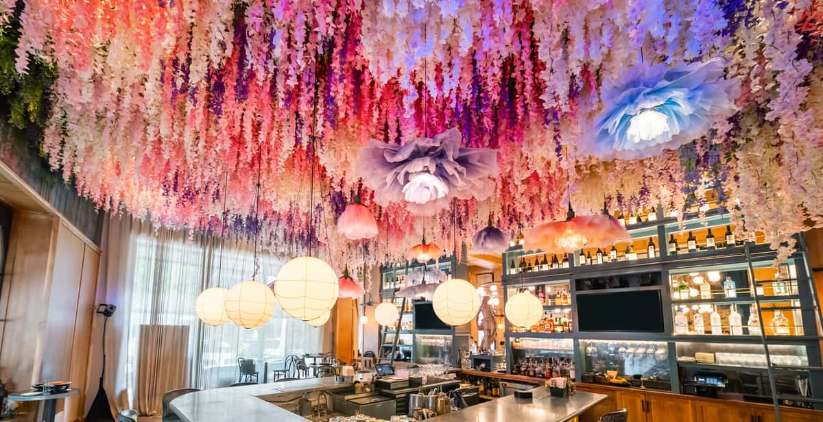 A picture of the floral flower ceiling installation at the the select restaurant and bar in sandy springs atlanta georgia