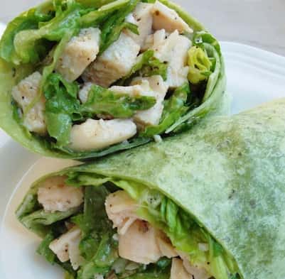 chicken caesar wrap in a spinach wrap