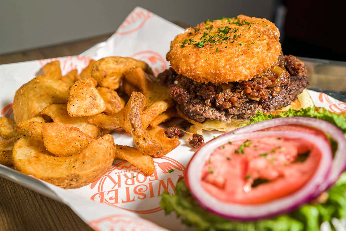 Click here to order online food. The picture shown is The Twisted Goat Burger.