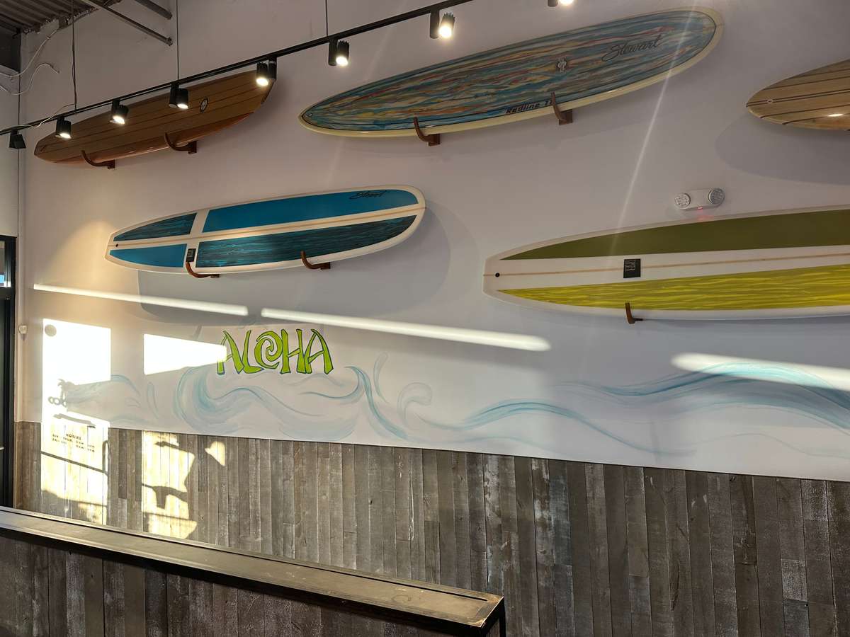 Surfboards placed on a wall for decorations