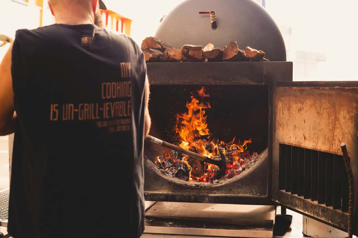 Cooking bbq in a fiery bbq grill