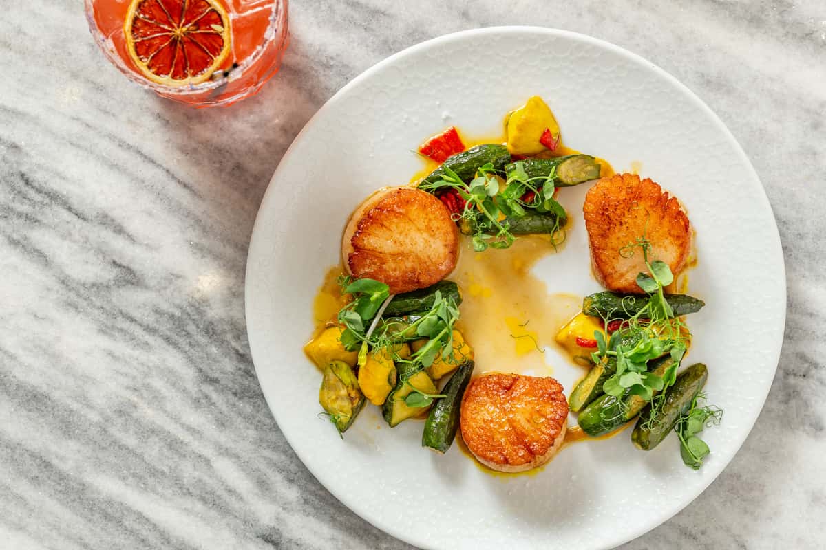 scallops with summer squash, pine nut pesto, lemon-thyme beurre blanc