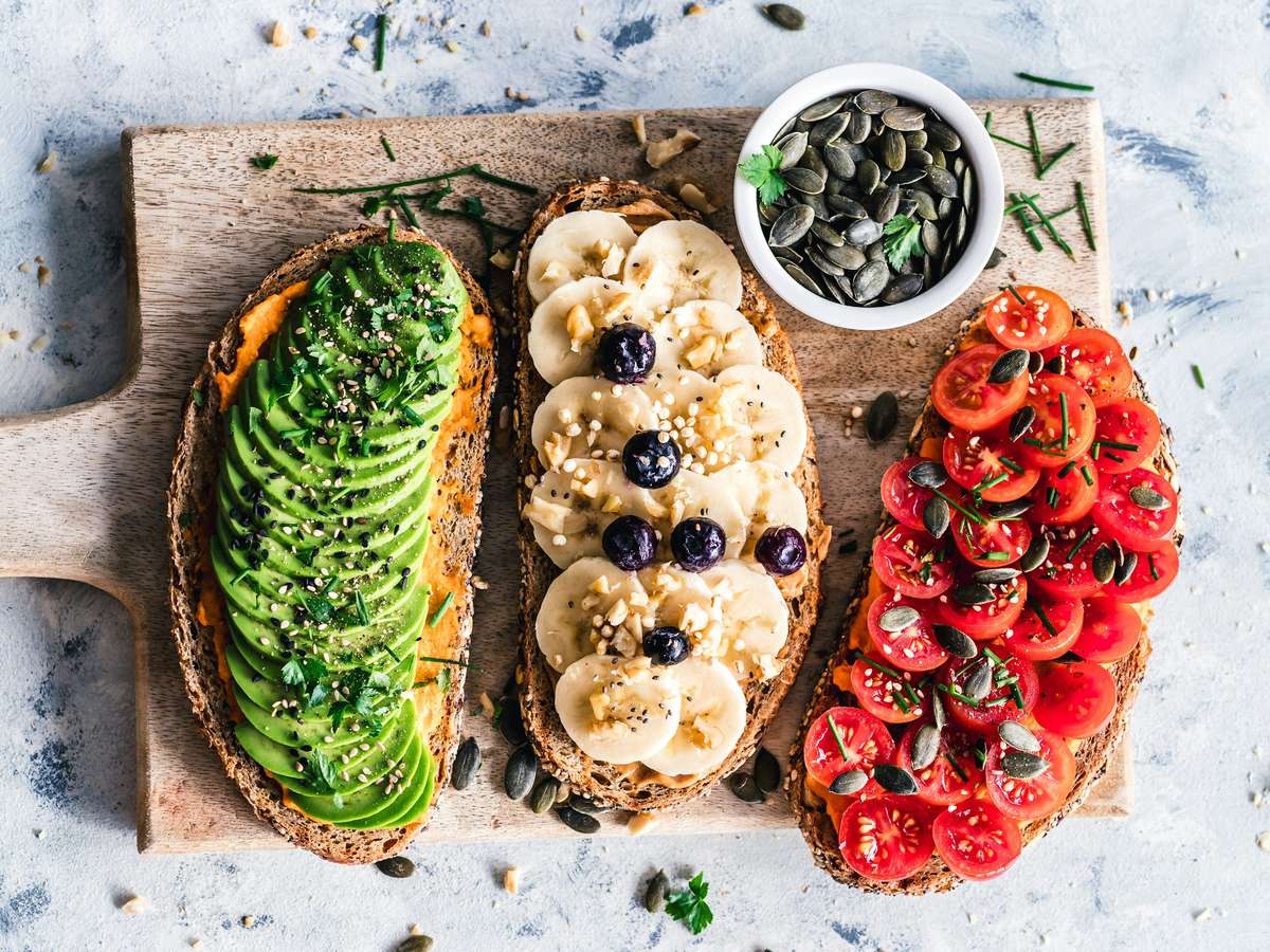 Bread toasts with avocado, banana, tomato. Easy to make, great for a quick breakfast