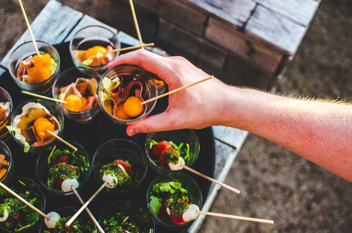 catering on of small portions of food on a glass