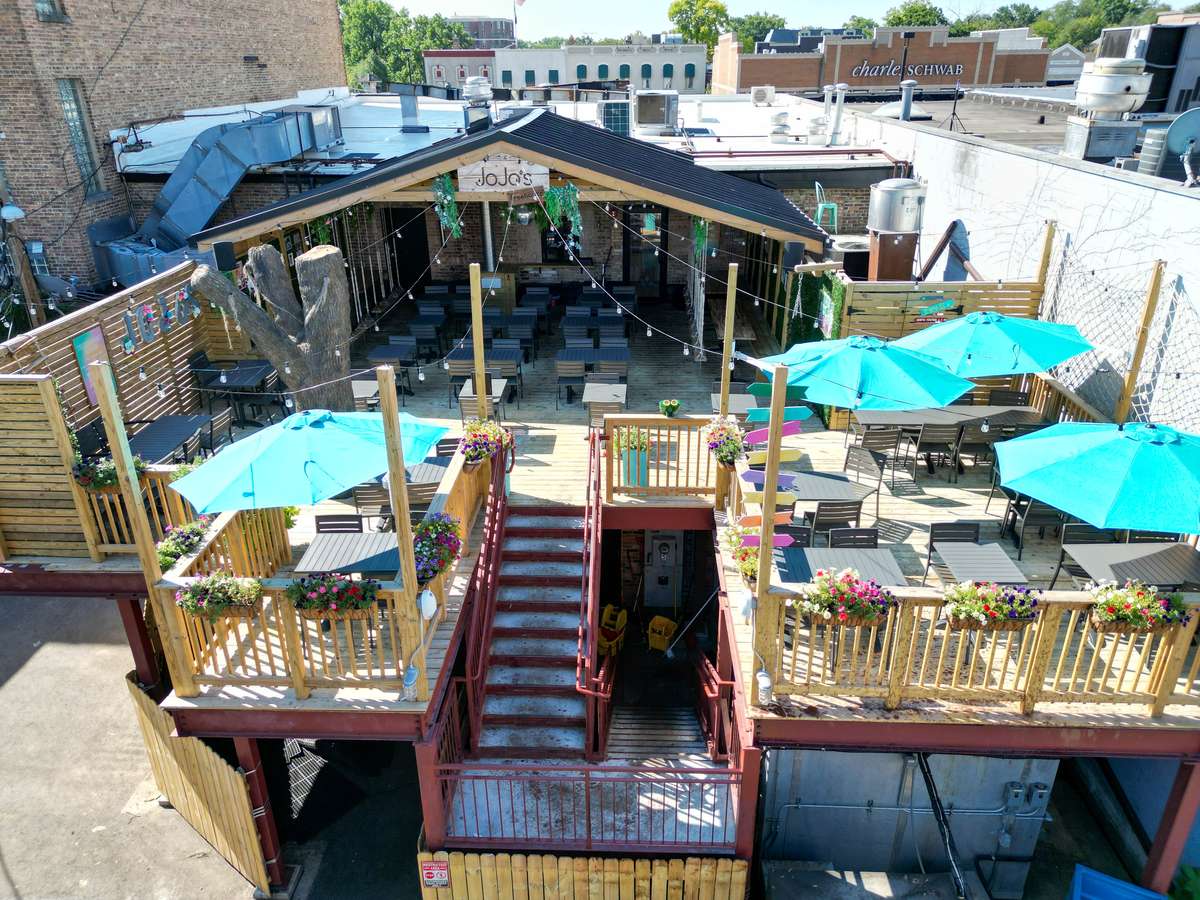 Host an unforgettable experience at our rooftop patio in the heart of downtown Naperville. Decked out in themed decor year round, this unique indoor/outdoor space can accommodate over 125 guests.