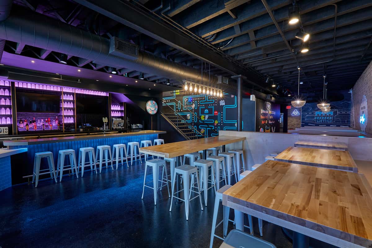 An intimate space lined with illuminated milk bottles, murals of pop icons, high top seating, and a private full service bar. Seat 60 comfortably or opt for a reception for up to 75 and host the perfect happy hour.