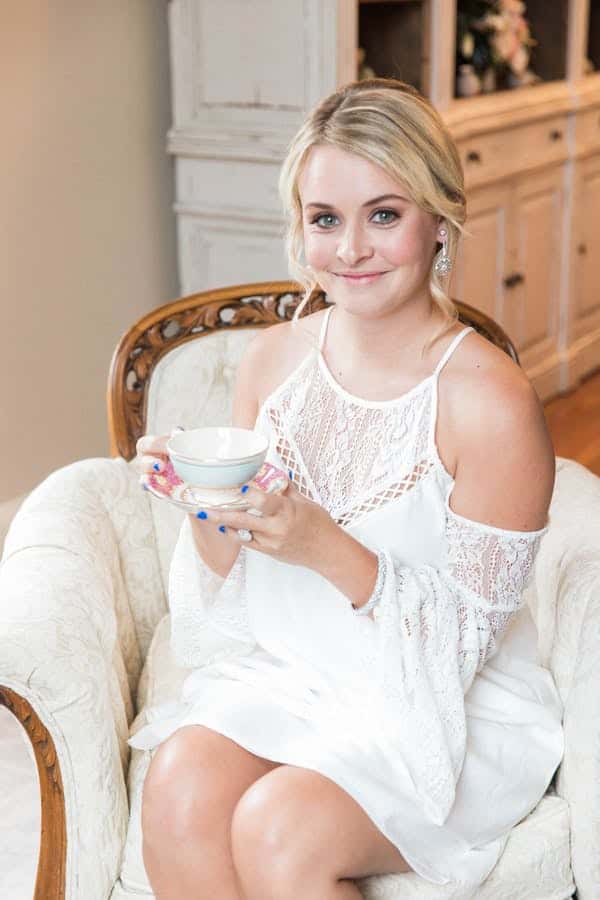 bride holding teacup