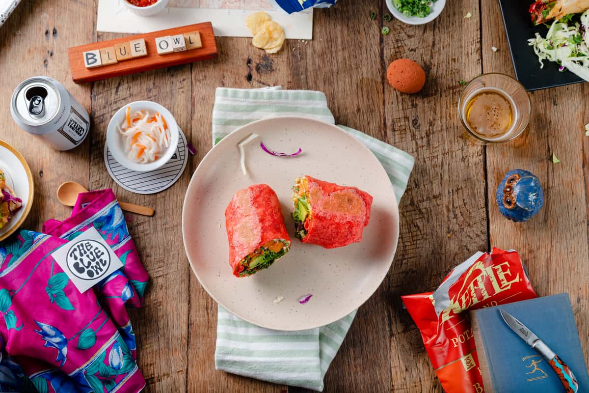 burritos with drink and sides