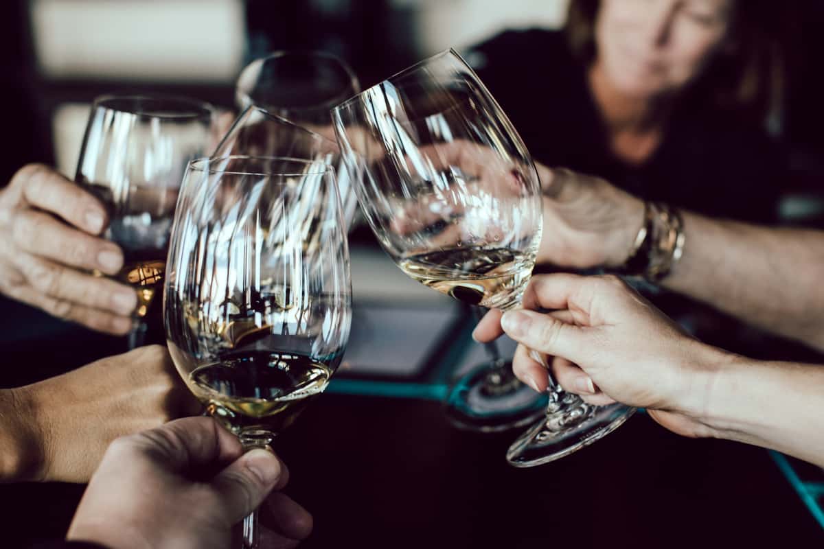 people toasting with wine