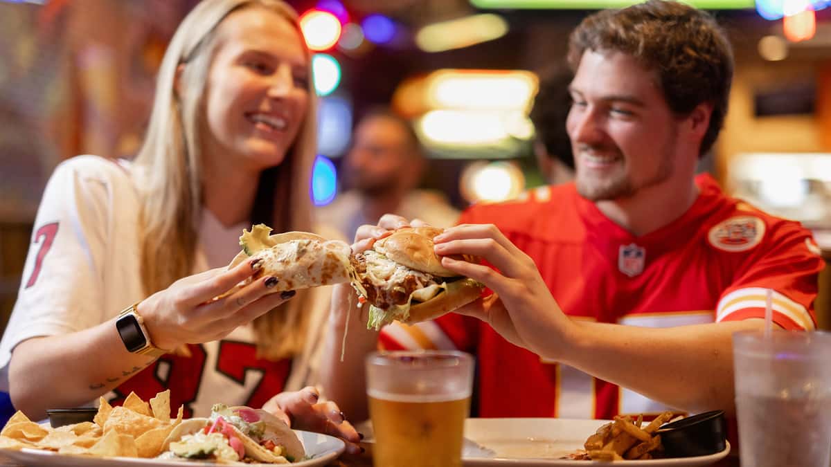 A couple eating dinner for their anniversary at Carolina Ale House