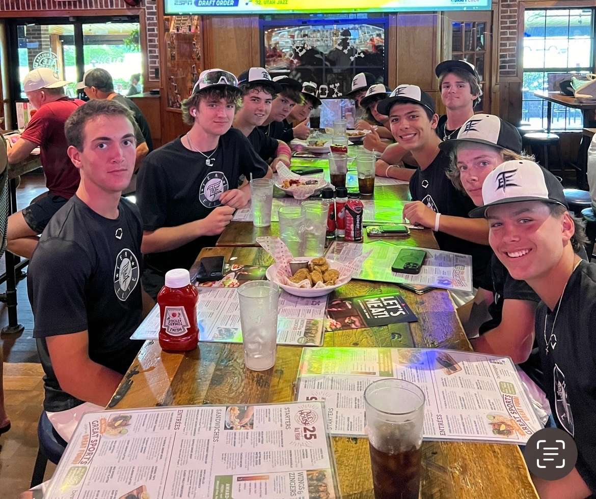 Team Elite National 14U enjoying lunch at Carolina Ale House in Cary—fueling up with Frickles and Cheese Curds for the big game!