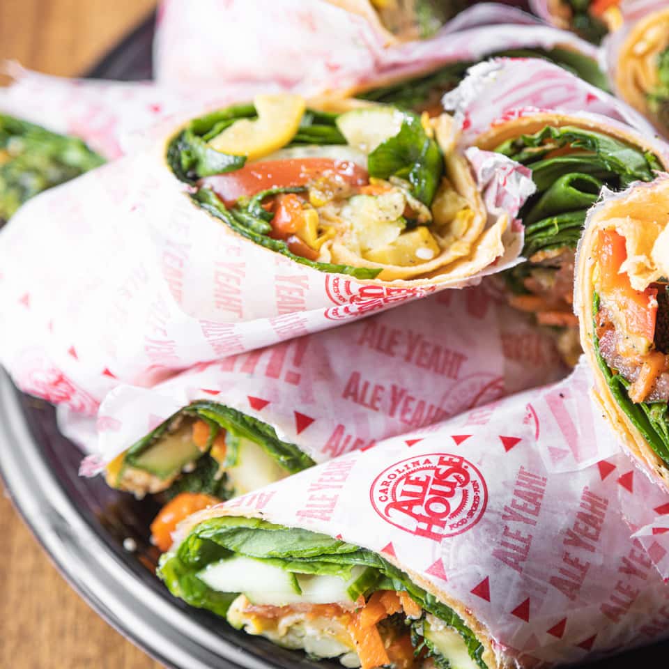 A platter of catered sandwich wraps