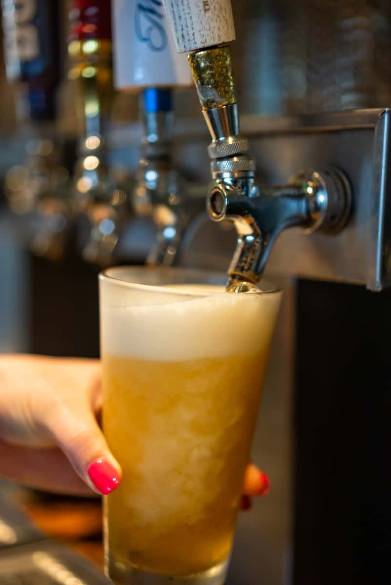Pouring a draft beer