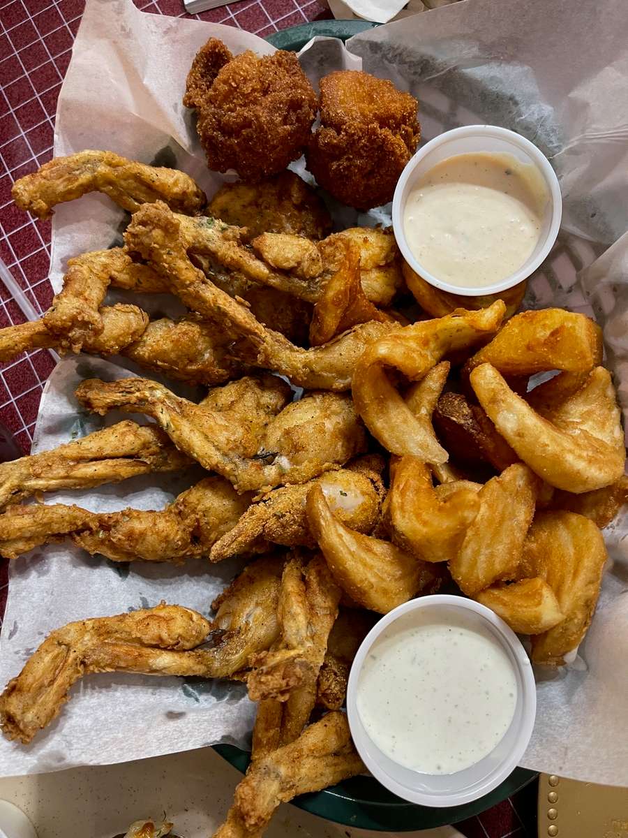 Fried to the perfect crisp with our signature seasonings. Served with a side and hushpuppies