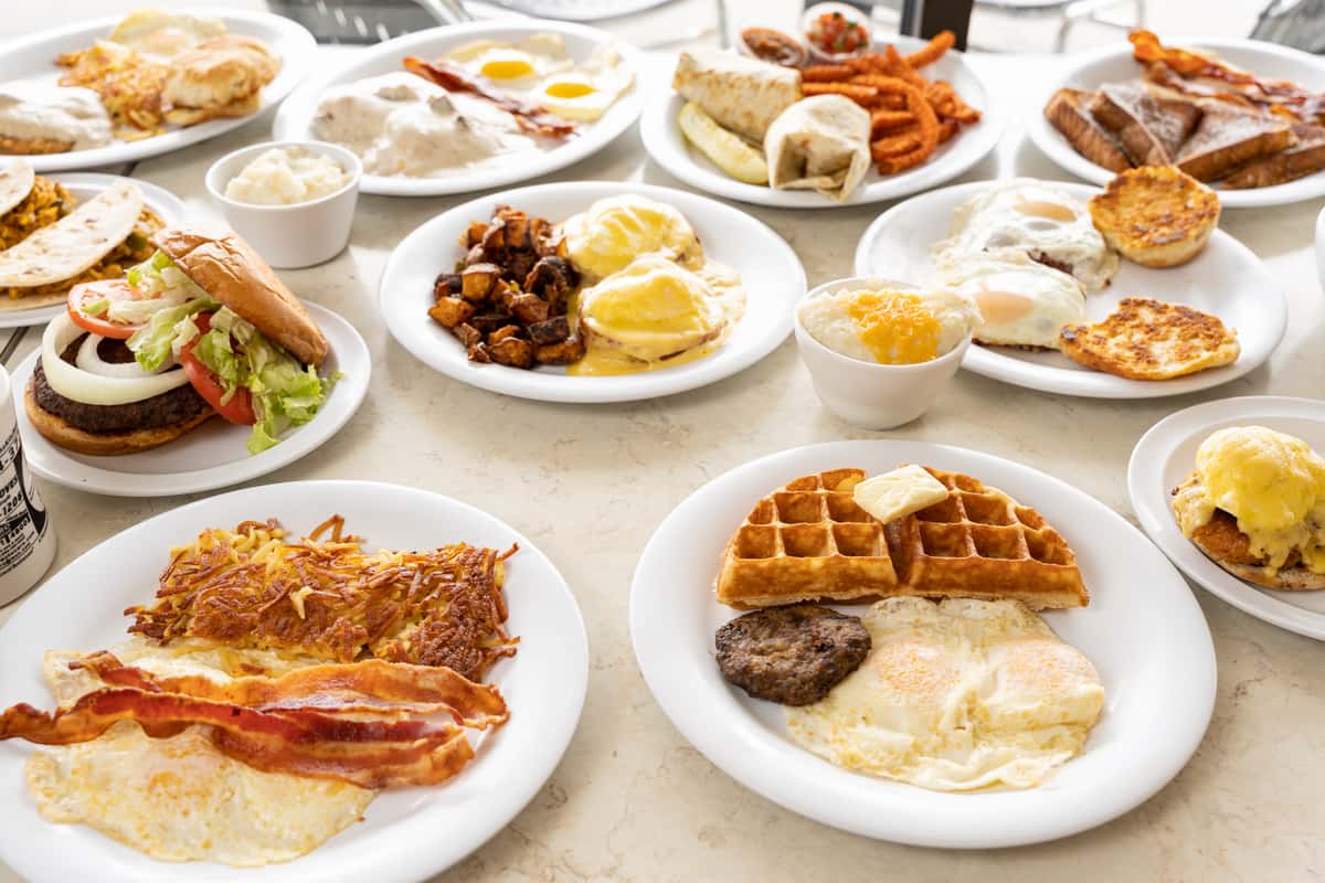 assorted breakfast foods on a table