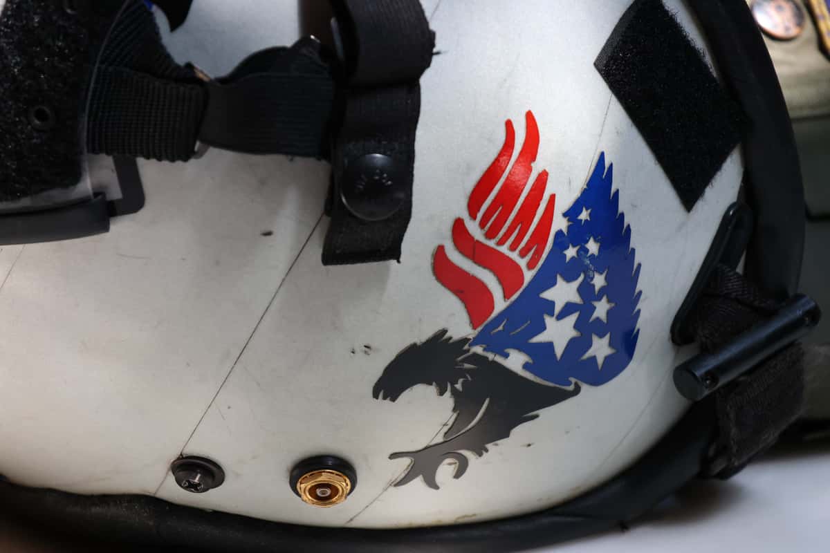 A side of Brent's helmet. It features a griffin motif with American flag themed wings.