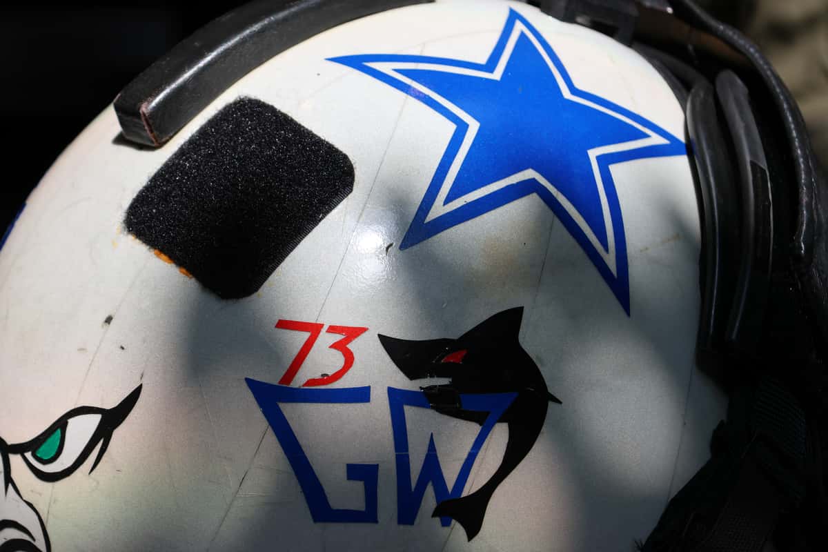 A side of Brent's helmet. It features a shark with "GW 73" and a blue star.