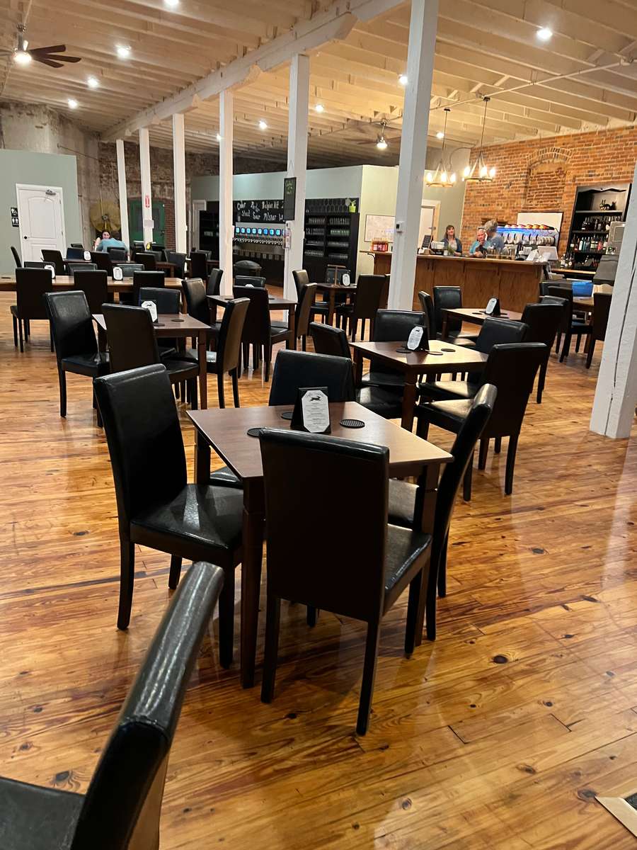 Table and chairs on a wooden floor