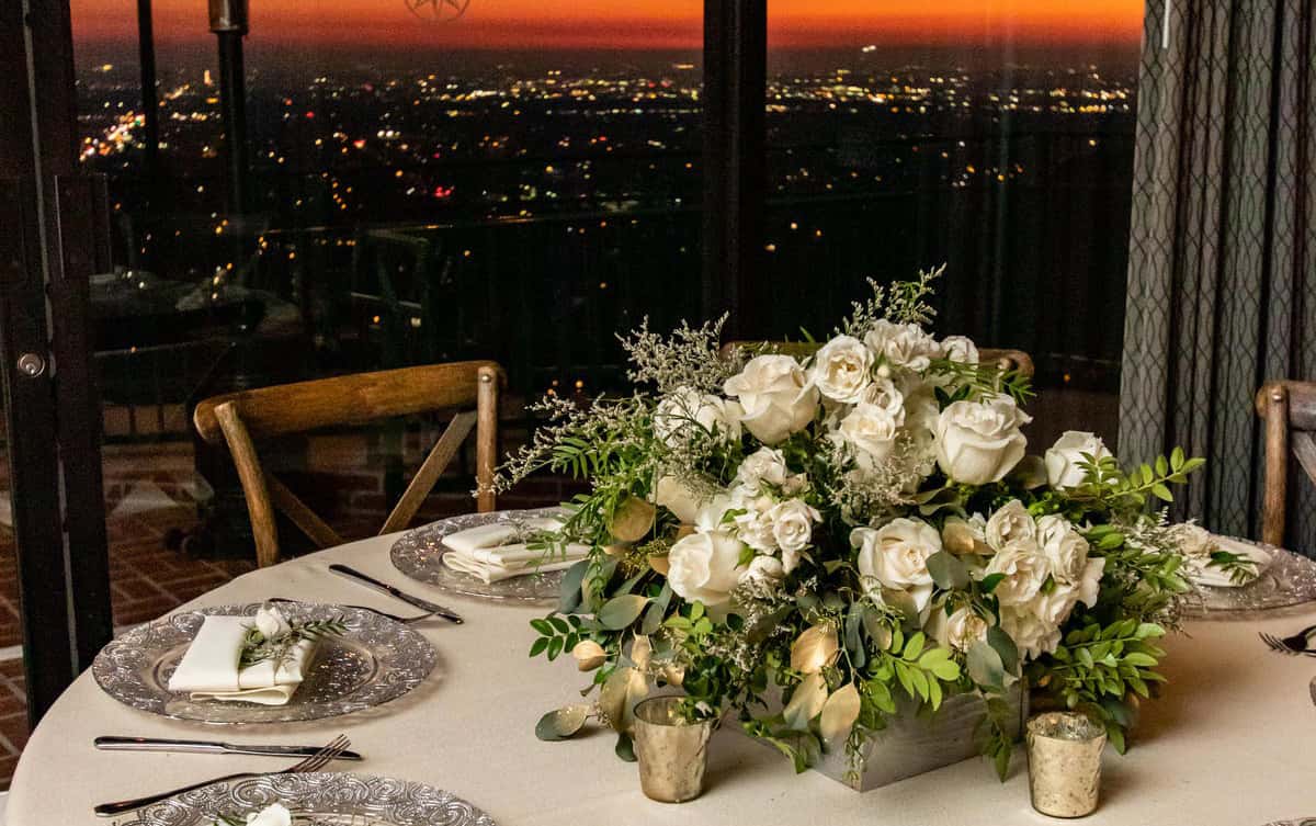 Evening Star Ballroom event space with a skyline view of Orange, CA at sunset