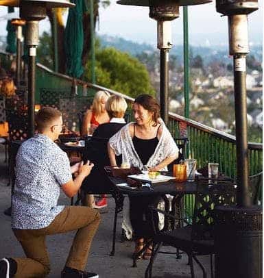 Gentleman proposing to his girlfriend at Orange Hill