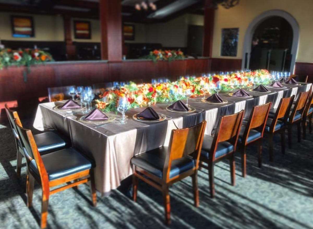 Event table setting with colorful flowers