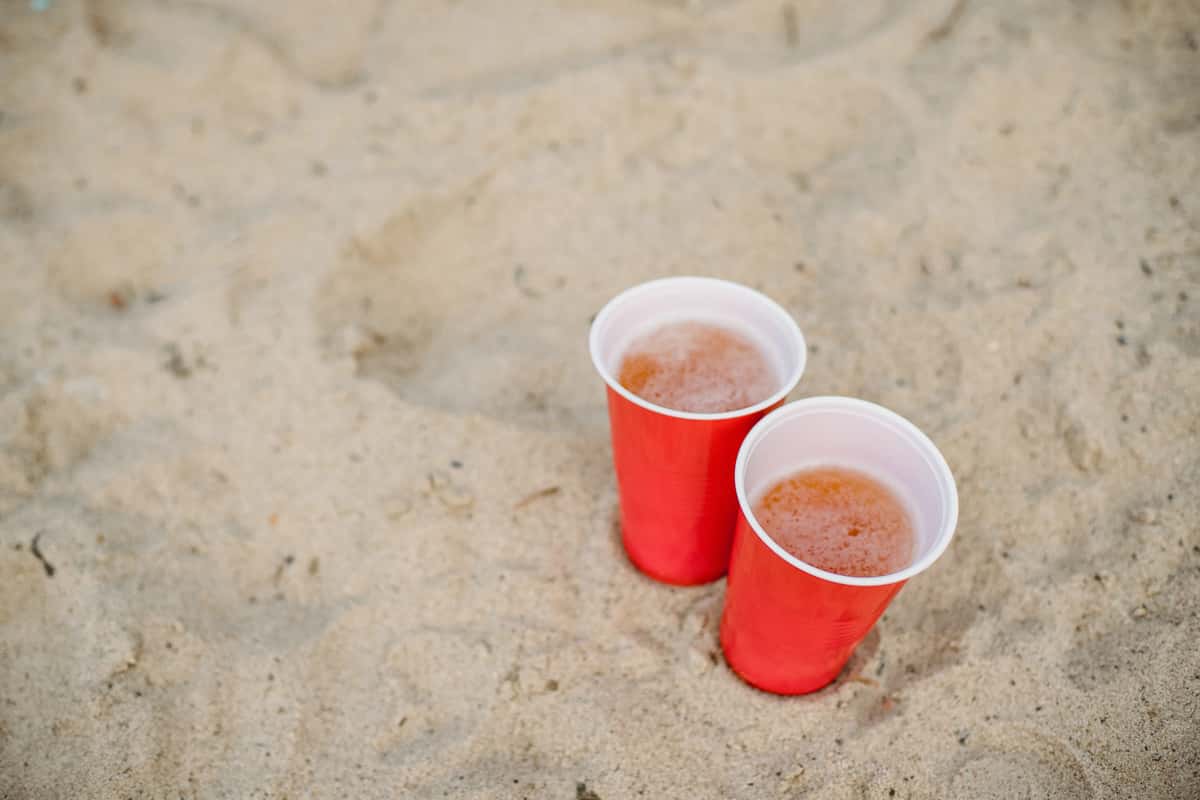 cups in the sand