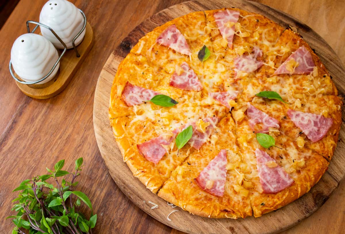 A freshly baked pizza from Blue Grotto and Curries.