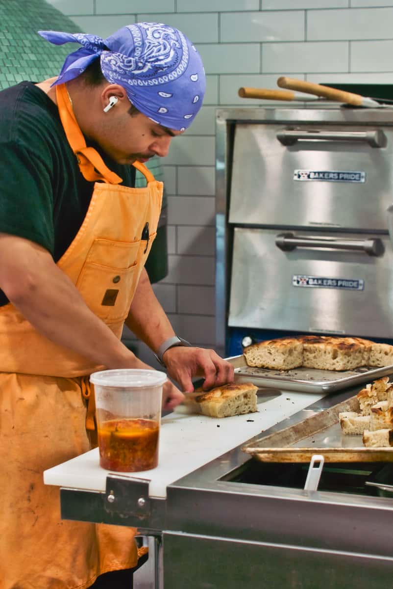 chef making pizza