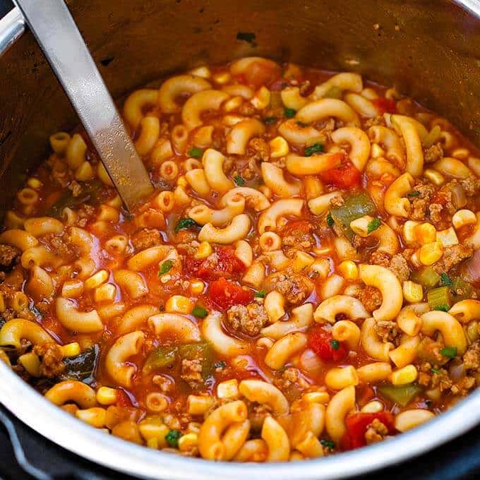 Pot of goulash soup: meat and vegetables seasoned with paprika and other spices
