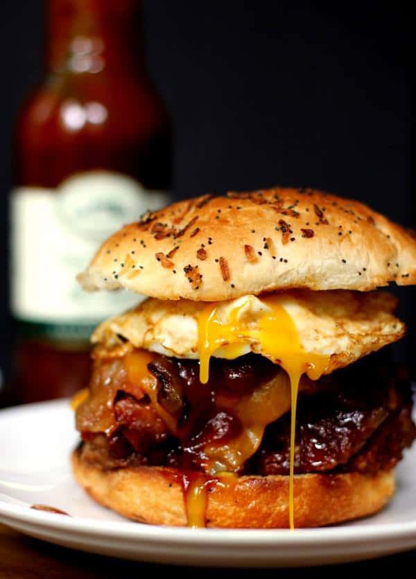 Sunrise Burger: Bacon cheeseburger topped with nacho cheese and a fried egg.