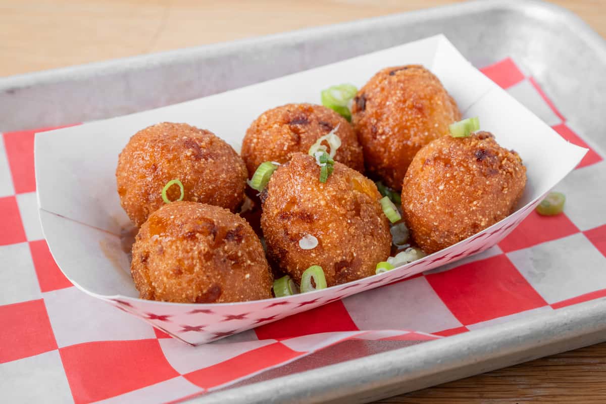 Golden fried corn pups served hot as a Southern appetizer at North Georgia BBQ
