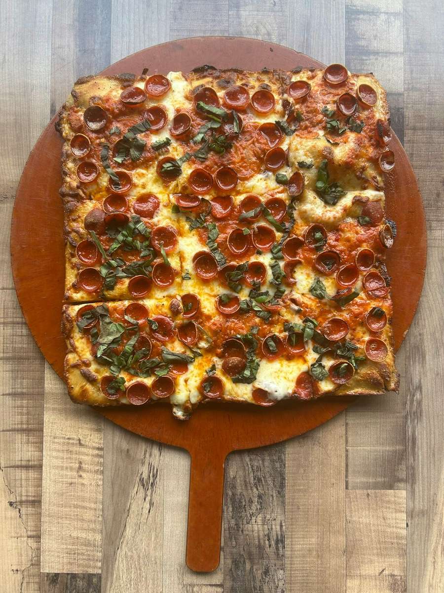 Grandma Pizza with Spicy Vodka sauce, basil and Cup Pepperoni