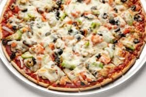 Mushrooms, onions, green peppers, green olives, black olives, and tomatoes