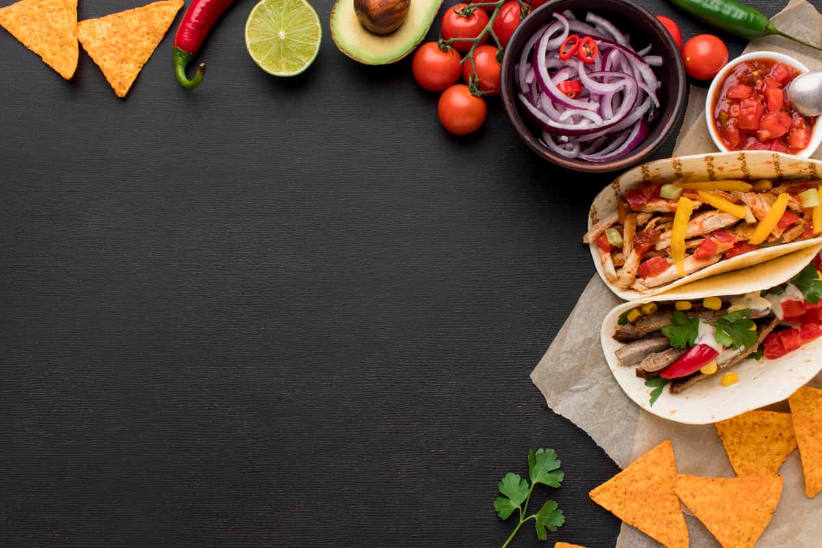 taco, fajita, and spread of fresh ingredients